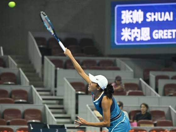 (240929) -- BEIJING, Sept. 29, 2024 -- Zhang Shuai serves during the women s singles third round match between Zhang Shuai of China and Greet Minnen of Belgium at 2024 China Open tennis tournament in Beijing, capital of China, Sept. 29, 2024. ) (SP)CHINA-BEIJING-TENNIS-CHINA OPEN-WOMEN S SINGLES (CN) ZhangxLong 