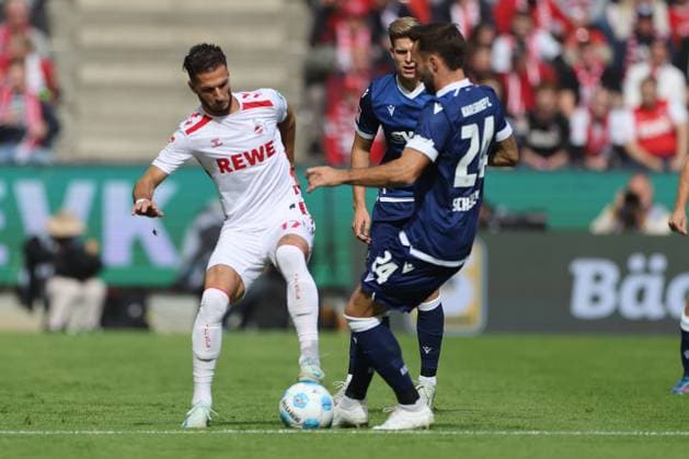GER, 2.FBL. 1. FC Koeln vs. Karlsruher SC 29.09.2024, Rheinenergie Stadion, Koeln, GER, 2.FBL. 1. FC Koeln vs. Karlsruher SC , im Bild: Leart Paqarada (FC Koeln 17),im Zweikampf gegen Fabian Schleusener (Karlsruhe 34),