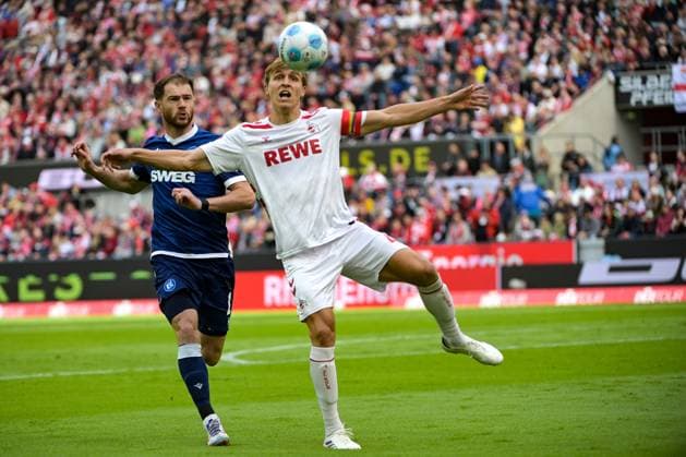 29.09.2024, xjpx, Fussball 2.Bundesliga, 1.FC Koeln - Karlsruher SC emspor, v.l. v.l. Budu Zivzivade (Karlsruhe) - Timo Hübers (Koeln) (DFL DFB REGULATIONS PROHIBIT ANY USE OF PHOTOGRAPHS as IMAGE SEQUENCES and or QUASI-VIDEO) Koeln