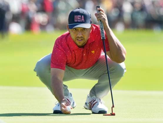 September 29, 2024, Montreal, Pq, Canada: United States team member Xander Schauffele lines up a putt on the first hole during their fifth round singles match at the Presidents Cup golf tournament at Royal Montreal Golf Club on Sunday, September 29, 2024 in Montreal. Xander Schauffele  - ZUMAc35_ 20240929_zaf_c35_002 Copyright: xFrankxGunnx