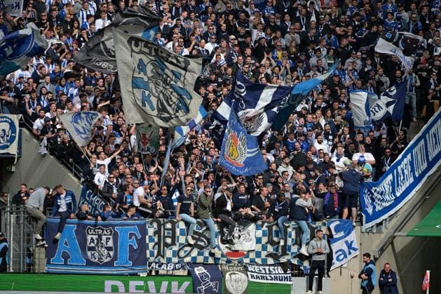 29.09.2024, xjpx, Fussball 2.Bundesliga, 1.FC Koeln - Karlsruher SC emspor, v.l. Mitgereiste Fans aus Karlsruhe im Koelner RheinEnergie Stadion (DFL DFB REGULATIONS PROHIBIT ANY USE OF PHOTOGRAPHS as IMAGE SEQUENCES and or QUASI-VIDEO) Koeln