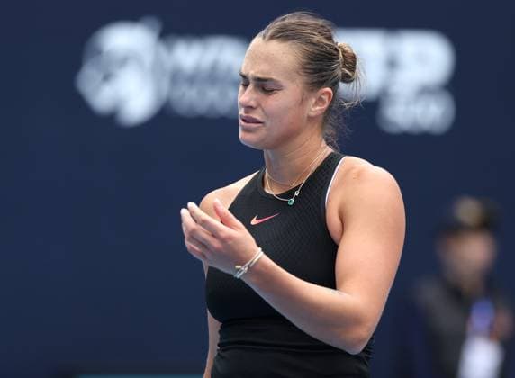 (240930) -- BEIJING, Sept. 30, 2024 -- Aryna Sabalenka of Belarus reacts during the women s singles third round match against Ashlyn Krueger of the United States at 2024 China Open tennis tournament in Beijing, capital of China, Sept. 30, 2024. ) (SP)CHINA-BEIJING-TENNIS-CHINA OPEN-WOMEN S SINGLES (CN) ZhangxChenlin 