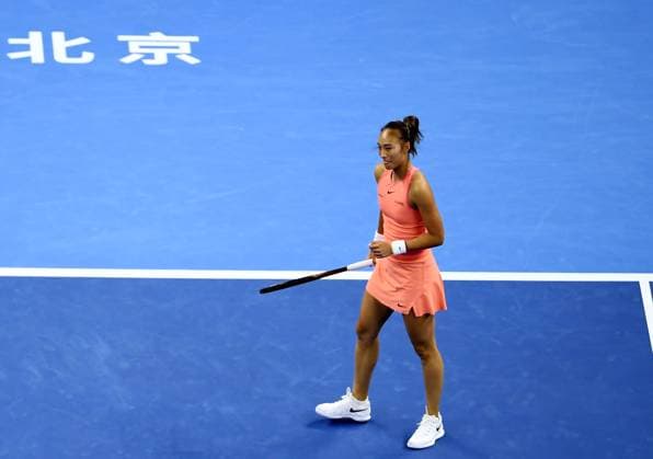 (240930) -- BEIJING, Sept. 30, 2024 -- Zheng Qinwen of China celebrates during the women s singles 3rd round match against Nadia Podoroska of Argentina at 2024 China Open tennis tournament in Beijing, capital of China, Sept. 30, 2024. ) (SP)CHINA-BEIJING-TENNIS-CHINA OPEN-WOMEN S SINGLES (CN) ZhangxChenlin 