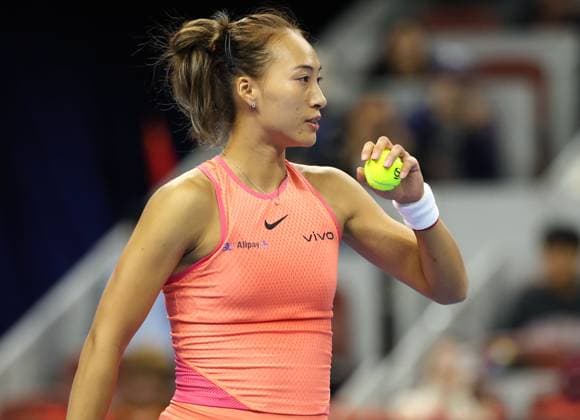 (240930) -- BEIJING, Sept. 30, 2024 -- Zheng Qinwen of China looks on during the women s singles 3rd round match against Nadia Podoroska of Argentina at 2024 China Open tennis tournament in Beijing, capital of China, Sept. 30, 2024. ) (SP)CHINA-BEIJING-TENNIS-CHINA OPEN-WOMEN S SINGLES (CN) ZhangxChenlin 
