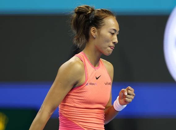 (240930) -- BEIJING, Sept. 30, 2024 -- Zheng Qinwen of China celebrates during the women s singles 3rd round match against Nadia Podoroska of Argentina at 2024 China Open tennis tournament in Beijing, capital of China, Sept. 30, 2024. ) (SP)CHINA-BEIJING-TENNIS-CHINA OPEN-WOMEN S SINGLES (CN) ZhangxChenlin 