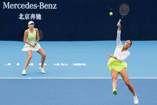 BEIJING, CHINA - SEPTEMBER 30: Lyudmyla Kichenok and Marta Kostyuk of Ukraine compete in the Women s Doubles Round of 32 match against Katerina Siniakova of Czech Republic and Taylor Townsend of America on day eight of 2024 China Open at National Tennis Center on September 30, 2024 in Beijing, China.  Copyright: xVCGx 111521261768