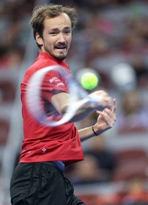 (241001) -- BEIJING, Oct. 1, 2024 -- Daniil Medvedev of Russia hits a return during the men s singles semi-final match against Carlos Alcaraz of Spain at 2024 China Open tennis tournament in Beijing, capital of China, Oct. 1, 2024. ) (SP)CHINA-BEIJING-TENNIS-CHINA OPEN-MEN S SINGLES (CN) BaixXuefei 