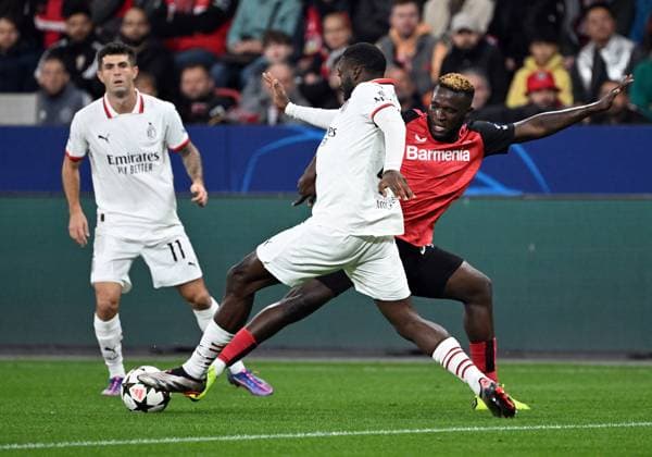 RECORD DATE NOT STATED 01.10.2024, xjhx, Fussball UEFA Champions League, Bayer 04 Leverkusen - AC Mailand emspor, v.l. Youssouf Fofana (AC Mailand), Victor Boniface (Bayer Leverkusen) (UEFA REGULATIONS PROHIBIT ANY USE OF PHOTOGRAPHS as IMAGE SEQUENCES and or QUASI-VIDEO) Leverkusen