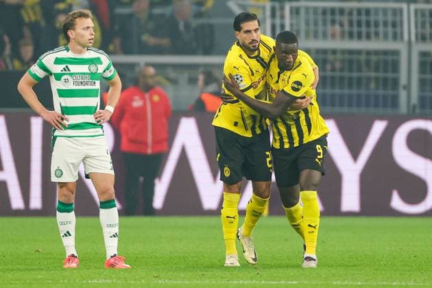 UEFA Champions League - Borussia Dortmund - Celtic Glasgow am 01.10.2024 im Signal Iduna Park in Dortmund Jubel, Torjubel, Torschuetze, Torschütze Emre Can (Dortmund 23) jubelt nach seinem Tor zum 1 zu 0 mit Serhou Guirassy (Dortmund 9) , Alistair Johnston (Celtic 2) schaut unzufrieden, enttäuscht, enttaeuscht, niedergeschlagen.