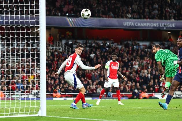 Arsenal v PSG 1 October 2024, London - UEFA Champion™s League Football - Arsenal v Paris Saint-Germain - Kai Havertz of Arsenal scores their first goal past Paris Saint Germain goalkeeper Gianluigi Donnarumma - Photo: Charlotte Wilson Offside. London UK Copyright: xCharlottexWilsonx xOffsidexOffside