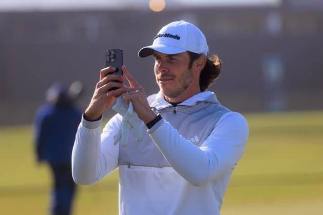 1st October 2024; Old Course at St Andrews, St Andrews, Fife, Scotland; Alfred Dunhill Links Golf Championship, Second Practice Day; Welsh former footballer Gareth Bale takes a photograph on the fairway of the first hole of the Old Course, St Andrews, during a practice round ahead of the Dunhill Links Championship  ActionPlus12698750 DavidxYoung