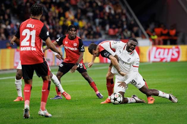 UEFA Champions League, Bayer 04 Leverkusen - AC Mailand; 01.10.2024 Granit Xhaka (Bayer 04 Leverkusen, 34) foult Youssouf Fofana (AC Mailand, 29) ; UEFA Champions League, Bayer 04 Leverkusen - AC Mailand, Spieltag 2 am 01.10.2024 in der BayArena in Leverkusen. Copyright: xBEAUTIFULxSPORTS AxelxKohringx