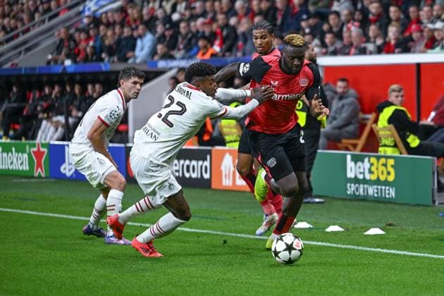 01.10.2024, Fussball, Champions League, 2. Spieltag, Saison 2024 2025, Bayer 04 Leverkusen - AC Mailand, Emerson (AC Mailand), Victor Boniface (Bayer Leverkusen) xRHR-FOTO TKx Copyright: RHR-FOTOx RHR-FOTO TK
