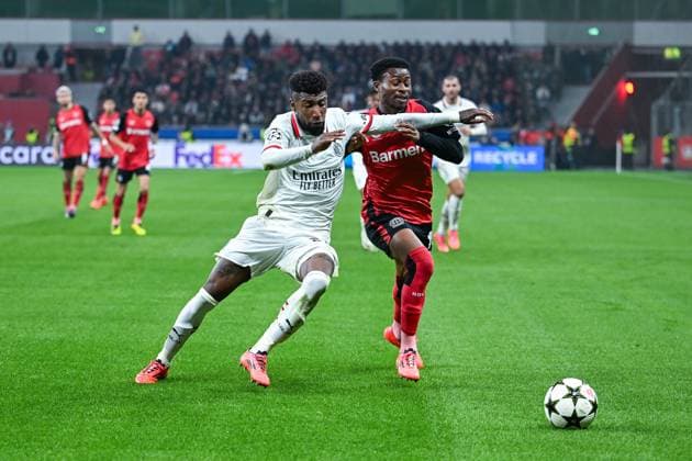 01.10.2024, Fussball, Champions League, 2. Spieltag, Saison 2024 2025, Bayer 04 Leverkusen - AC Mailand, Emerson (AC Mailand), Nathan Tella (Bayer Leverkusen) xRHR-FOTO TKx Copyright: RHR-FOTOx RHR-FOTO TK