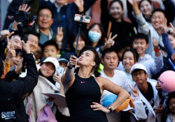 (241002) -- BEIJING, Oct. 2, 2024 -- Aryna Sabalenka of Belarus takes selfies after winning the Women s Singles Round of 16 match between Aryna Sabalenka of Belarus and Madison Keys of the United States at the 2024 China Open tennis tournament in Beijing, capital of China, Oct. 2, 2024. ) (SP)CHINA-BEIJING-TENNIS-CHINA OPEN-WOMEN S SINGLES (CN) WangxLili 