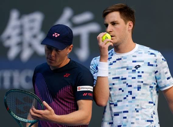 (241002) -- BEIJING, Oct. 2, 2024 -- Harri Heliovaara Henry Patten (R) communicate during the men s doubles final between Simone Bolelli Andrea Vavassori of Italy and Harri Heliovaara (Finland) Henry Patten (Britain) at the 2024 China Open tennis tournament in Beijing, China, Oct. 2, 2024. ) (SP)CHINA-BEIJING-TENNIS-CHINA OPEN-MEN S DOUBLES-FINAL (CN) WangxLili 