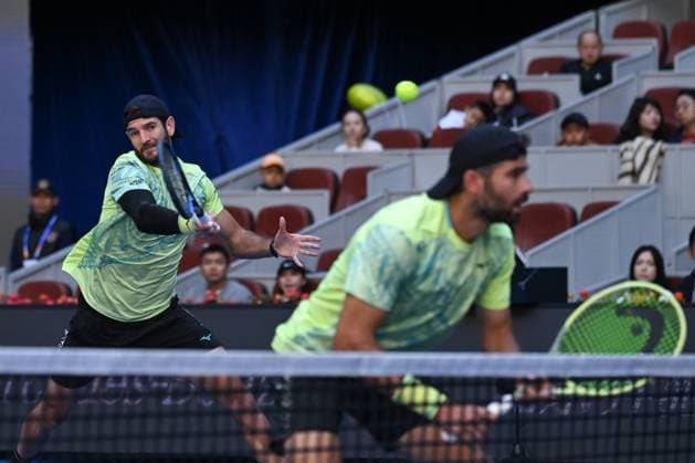 (241002) -- BEIJING, Oct. 2, 2024 -- Simone Bolelli Andrea Vavassori (L) compete during the men s doubles final between Simone Bolelli Andrea Vavassori of Italy and Harri Heliovaara (Finland) Henry Patten (Britain) at the 2024 China Open tennis tournament in Beijing, China, Oct. 2, 2024. ) (SP)CHINA-BEIJING-TENNIS-CHINA OPEN-MEN S DOUBLES-FINAL (CN) ZhangxLong 