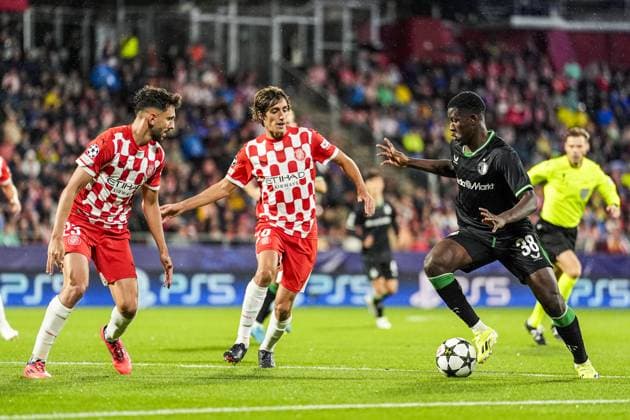 UEFA Champions League: Girona FC v Feyenoord Girona - Ivan Martin of Girona FC, Bryan Gil of Girona FC, Ibrahim Osman of Feyenoord during the second round of new format of the UEFA Champions League 2024 2025. The match is set between Girona FC and Feyenoord at Estadi Montilivi on 2 October 2024 in Girona, Spain. Copyright: xTomxBodex