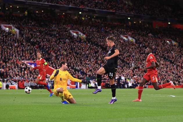 Liverpool v Bologna UEFA Champions League 2nd October 2024 - UEFA Champions League - Liverpool FC v Bologna FC - Thijs Dallinga of Bologna beats Liverpool goalkeeper Alisson Becker but his effort is disallowed for offside - Photo: Simon Stacpoole Offside. Liverpool UK Copyright: xSimonxStacpoolexOffside