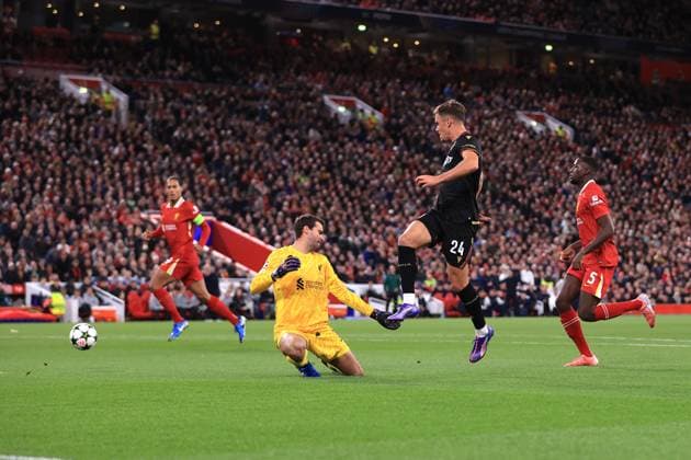 Liverpool v Bologna UEFA Champions League 2nd October 2024 - UEFA Champions League - Liverpool FC v Bologna FC - Thijs Dallinga of Bologna beats Liverpool goalkeeper Alisson Becker but his effort is disallowed for offside - Photo: Simon Stacpoole Offside. Liverpool UK Copyright: xSimonxStacpoolexOffside