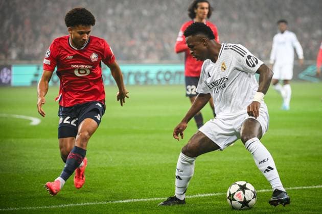 October 2, 2024, Villeneuve-D ascq, France, France: Tiago SANTOS of Lille and Vinicius Junior (Jr) of Real Madrid during the UEFA Champions League, League Phase MD2 match between Lille OSC (LOSC) and Real Madrid at Pierre Mauroy Stadium on October 02, 2024 in Villeneuve-d Ascq near Lille, France. Villeneuve-D ascq France - ZUMAm308 20241002_zsp_m308_002 Copyright: xMatthieuxMirvillex