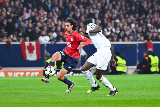 Ayyoub BOUADDI ( 32 - Lille ) and Eder Militao ( 3 - Real Madrid ) during the UEFA Champions League match between Lille OSC and Real Madrid CF at Stade Pierre Mauroy on October 02, 2024 in Lille, France. ( Photo by federico pestellini panoramic ) - FOOTBALL : Lille vs Real Madrid - Ligue des Champions - 02 10 2024 FedericoPestellini Panoramic 