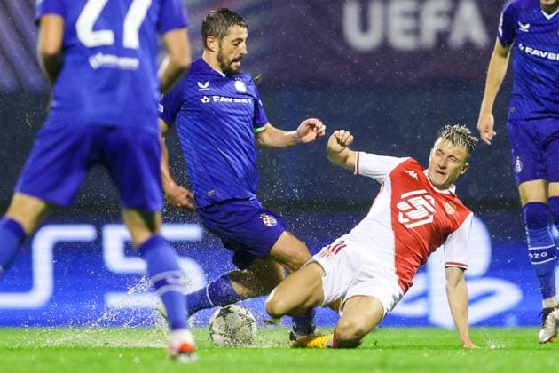 GNK Dinamo v AS Monaco - UEFA Champions League 2024 25 League Phase MD2 ZAGREB, CROATIA - OCTOBER 2: Aleksandr Golovin of Monaco in action against Arijan Ademi of Dinamo Zagreb during UEFA Champions League 2024 25 League Phase MD2 match between GNK Dinamo v AS Monaco at Maksimir Stadion on October 2, 2024 in Zagreb, Croatia.  LukaxStanzl PIXSELL