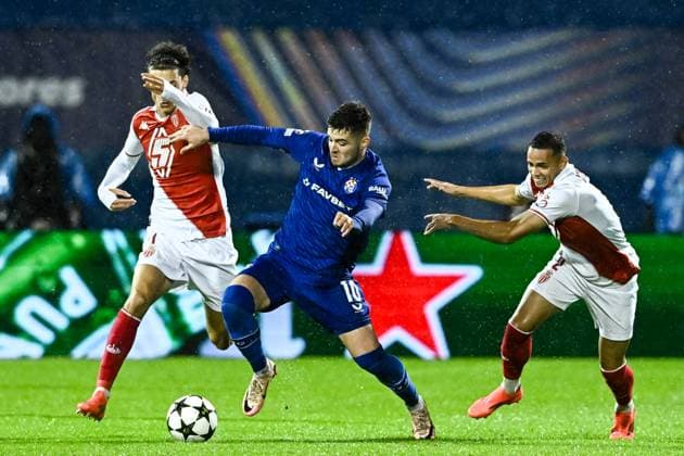 GNK Dinamo v AS Monaco - UEFA Champions League 2024 25 League Phase MD2 ZAGREB, CROATIA - OCTOBER 2: Maghnes Akliouche of Monaco in action against Martin Baturina of Dinamo Zagreb during UEFA Champions League 2024 25 League Phase MD2 match between GNK Dinamo v AS Monaco at Maksimir Stadion on October 2, 2024 in Zagreb, Croatia.  MarkoxLukunic PIXSELL