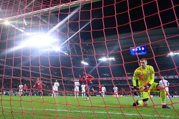 Jonathan David ( 9 - Lille ) beats Andriy Lunin ( 13 - Real Madrid ) by penalty during the UEFA Champions League match between Lille OSC and Real Madrid CF at Stade Pierre Mauroy on October 02, 2024 in Lille, France. ( Photo by federico pestellini panoramic ) - FOOTBALL : Lille vs Real Madrid - Ligue des Champions - 02 10 2024 FedericoPestellini Panoramic 