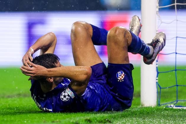 GNK Dinamo v AS Monaco - UEFA Champions League 2024 25 League Phase MD2 ZAGREB, CROATIA - OCTOBER 2: Raul Torrente of Dinamo Zagreb lies injured during UEFA Champions League 2024 25 League Phase MD2 match between GNK Dinamo v AS Monaco at Maksimir Stadion on October 2, 2024 in Zagreb, Croatia.  LukaxStanzl PIXSELL