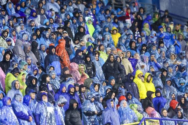 GNK Dinamo v AS Monaco - UEFA Champions League 2024 25 League Phase MD2 ZAGREB, CROATIA - OCTOBER 2: Fans cheer on a heavy rain during UEFA Champions League 2024 25 League Phase MD2 match between GNK Dinamo v AS Monaco at Maksimir Stadion on October 2, 2024 in Zagreb, Croatia.  LukaxStanzl PIXSELL