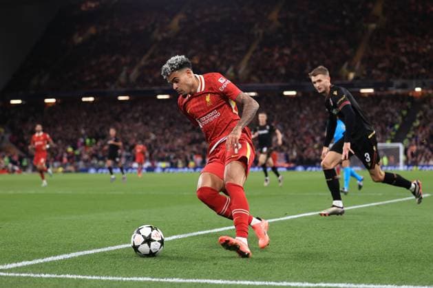 Liverpool v Bologna UEFA Champions League 2nd October 2024 - UEFA Champions League - Liverpool FC v Bologna FC - Luis Diaz of Liverpool gets away from Stefan Posch of Bologna - Photo: Simon Stacpoole Offside. Liverpool UK Copyright: xSimonxStacpoolexOffside