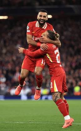 Liverpool v Bologna UEFA Champions League 2nd October 2024 - UEFA Champions League - Liverpool FC v Bologna FC - Mohamed Salah of Liverpool celebrates the second goal with Kostas Tsimikas - Photo: Simon Stacpoole Offside. Liverpool UK Copyright: xSimonxStacpoolexOffside