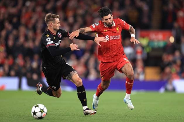 Liverpool v Bologna UEFA Champions League 2nd October 2024 - UEFA Champions League - Liverpool FC v Bologna FC - Stefan Posch of Bologna and Dominik Szoboszlai of Liverpool - Photo: Simon Stacpoole Offside. Liverpool UK Copyright: xSimonxStacpoolexOffside