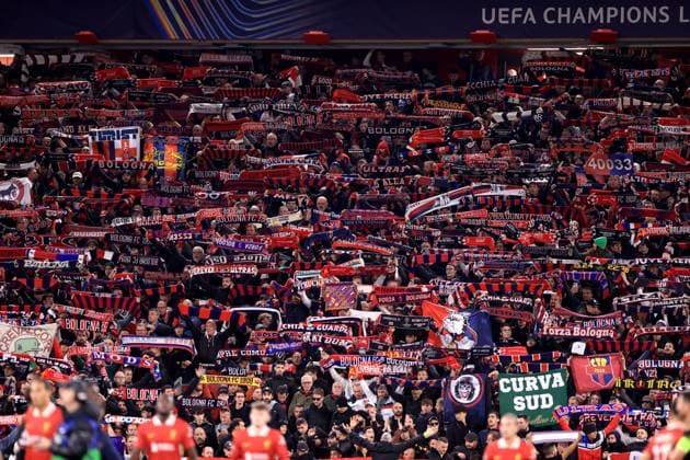 Liverpool v Bologna UEFA Champions League 2nd October 2024 - UEFA Champions League - Liverpool FC v Bologna FC - Bologna fans hold their scarves aloft - Photo: Simon Stacpoole Offside. Liverpool UK Copyright: xSimonxStacpoolexOffside