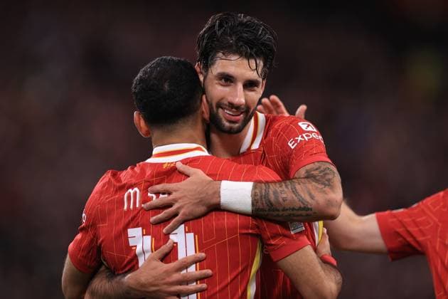 Liverpool v Bologna UEFA Champions League 2nd October 2024 - UEFA Champions League - Liverpool FC v Bologna FC - Dominik Szoboszlai of Liverpool celebrates with Mohamed Salah - Photo: Simon Stacpoole Offside. Liverpool UK Copyright: xSimonxStacpoolexOffside