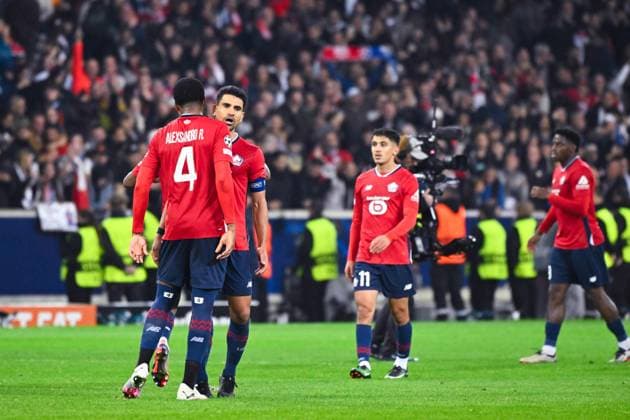Benjamin Andre ( 21 - Lille ) , Alexsandro RIBEIRO ( 4 - Lille ) and Lille players celebrate their side s victory after the UEFA Champions League match between Lille OSC and Real Madrid CF at Stade Pierre Mauroy on October 02, 2024 in Lille, France. ( Photo by federico pestellini panoramic ) - FOOTBALL : Lille vs Real Madrid - Ligue des Champions - 02 10 2024 FedericoPestellini Panoramic 