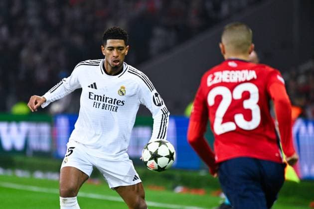Jude Bellingham ( 5 - Real Madrid ) and Edon ZHEGROVA ( 23 - Lille ) during the UEFA Champions League match between Lille OSC and Real Madrid CF at Stade Pierre Mauroy on October 02, 2024 in Lille, France. ( Photo by federico pestellini panoramic ) - FOOTBALL : Lille vs Real Madrid - Ligue des Champions - 02 10 2024 FedericoPestellini Panoramic 