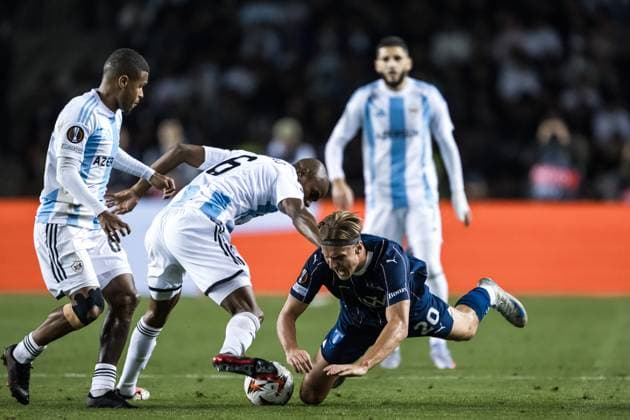 241003 Erik Botheim of Malmö FF and Julio Romao of Qarabag during the UEFA Europa League football match between Qarabag and Malmö FF on October 3, 2024 in Baku. Photo: Petter Arvidson BILDBYRAN kod PA PA0893 fotboll football soccer fotball uefa europa league qarabag malmö ff bbeng bbauto Copyright: PETTERxARVIDSON BB241003PA062