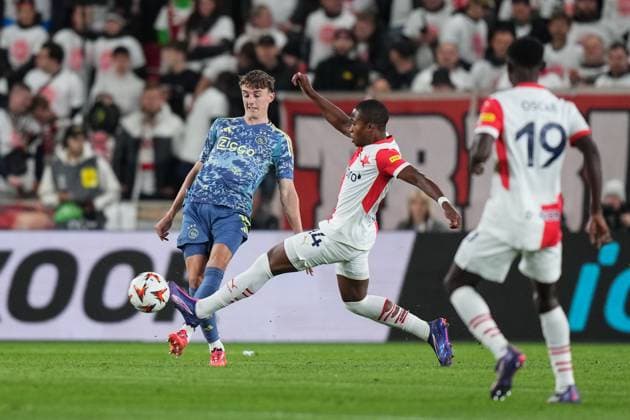 PRAGUE, 03-10-2024 , Eden Arena, football, UEFA Europa League, season 2024 2025, Match between Slavia Praag and Ajax , (L-R) Ajax player Youri Baas, Slavia Praag player Simion Michez Slavia Praag - Ajax  x26382267x Copyright: