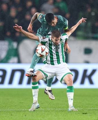 Cristian Romero of Tottenham Hotspur competes for the ball with Barnabas Varga of Ferencvaros Ferencvaros v Tottenham Hotspur, UEFA Europa League, Group Stage, Football, Groupama Arena, Budapest, Hungary, 03 Oct 2024 EDITORIAL USE ONLY No use with unauthorised audio, video, data, fixture lists, club league logos or live services. Online in-match use limited to 120 images, no video emulation. No use in betting, games or single club league player publications. Copyright: xMichaelxZemanek Shutterstockx 14750796s