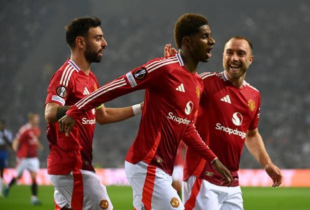 Marcus Rashford of Manchester United, ManU celebrates scoring to make it 0-1 Porto v Manchester United, UEFA Europa League, Group Stage, Football, Estadio do Dragao, Porto, Portugal, 03 Oct 2024 EDITORIAL USE ONLY No use with unauthorised audio, video, data, fixture lists, club league logos or live services. Online in-match use limited to 120 images, no video emulation. No use in betting, games or single club league player publications.  Copyright: xZedxJameson Shutterstockx 14750815bt