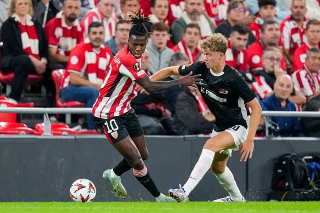 2024-10-03 Athletic Club v AZ - UEFA Europa League 2024 25 League Phase MD2 BILBAO, SPAIN - OCTOBER 3: Nico Williams of Athletic Club battles for possession with Sven Mijnans of AZ Alkmaar during the UEFA Europa League 2024 25 League Phase MD2 match between Athletic Club and AZ at Estadio de San MamÃ s on October 3, 2024 in Bilbao, Spain. Bilbao Estadio de San MamÃ s Spain Content not available for redistribution in The Netherlands directly or indirectly through any third parties. Copyright: xEdxvanxdexPolx