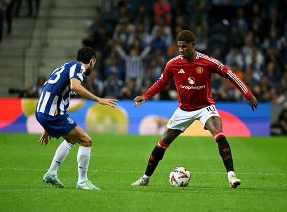 Joao Mario of Porto FC and Marcus Rashford of Manchester United, ManU Porto v Manchester United, UEFA Europa League, Group Stage, Football, Estadio do Dragao, Porto, Portugal, 03 Oct 2024 EDITORIAL USE ONLY No use with unauthorised audio, video, data, fixture lists, club league logos or live services. Online in-match use limited to 120 images, no video emulation. No use in betting, games or single club league player publications.  Copyright: xZedxJameson Shutterstockx 14750815dn