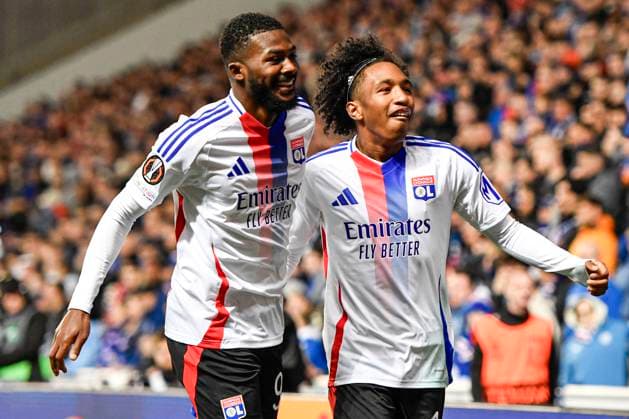 Rangers v Olympique Lyonnais UEFA Europa League Malick Fofana of Olympique Lyonnais celebrates his sides goal with Ainsley Maitland-Niles during the UEFA Europa League match at Ibrox Stadium, Glasgow UK Newspapers OUT Copyright: xJamiexJohnstonx FIL-20729-0050