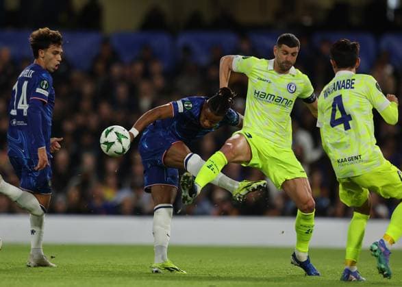 3rd October 2024; Stamford Bridge, Chelsea, London, England: UEFA Europa Conference League Football, Chelsea versus Gent; Christopher Nkunku of Chelsea challenged and blocked by Stefan Mitrovic of KAA Gent  ActionPlus12699488 JohnxPatrickxFletcher