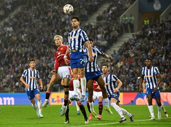 Thomas Myles of Manchester United, ManU and Alejandro Garnacho of Manchester United Porto v Manchester United, UEFA Europa League, Group Stage, Football, Estadio do Dragao, Porto, Portugal, 03 Oct 2024 EDITORIAL USE ONLY No use with unauthorised audio, video, data, fixture lists, club league logos or live services. Online in-match use limited to 120 images, no video emulation. No use in betting, games or single club league player publications.  Copyright: xZedxJameson Shutterstockx 14750815fu