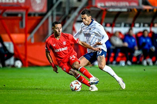 FC Twente defender Anass Salah-Eddine, Fenerbahce midfielder Irfan Can Kahveci, during the match Twente - Fenerbahce at the Grolsch Veste for the UEFA Europa League - League phase - Matchday 2 season 2024-2025 in ENSCHEDE, Netherlands on 3 oktober 2024, (photo by Stefan Koops EYE4images DeFodi Images) Defodi-746_192539