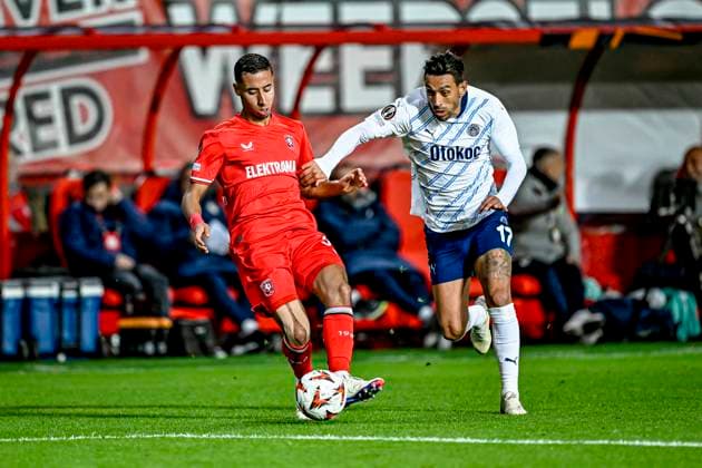 FC Twente defender Anass Salah-Eddine, Fenerbahce midfielder Irfan Can Kahveci, during the match Twente - Fenerbahce at the Grolsch Veste for the UEFA Europa League - League phase - Matchday 2 season 2024-2025 in ENSCHEDE, Netherlands on 3 oktober 2024, (photo by Stefan Koops EYE4images DeFodi Images) Defodi-746_192542