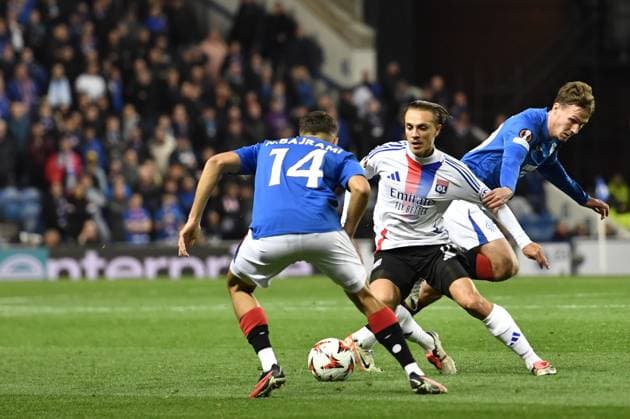 Rangers v Olympique Lyonnais UEFA Europa League Nedim Bajrami and Kieran Dowell of Rangers and Maxence Caqueret of Olympique Lyonnais during the UEFA Europa League match at Ibrox Stadium, Glasgow UK Newspapers OUT Copyright: xJamiexJohnstonx FIL-20729-0110